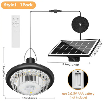 Solar pendant light with remote control, solar panel, and battery pack on a white background