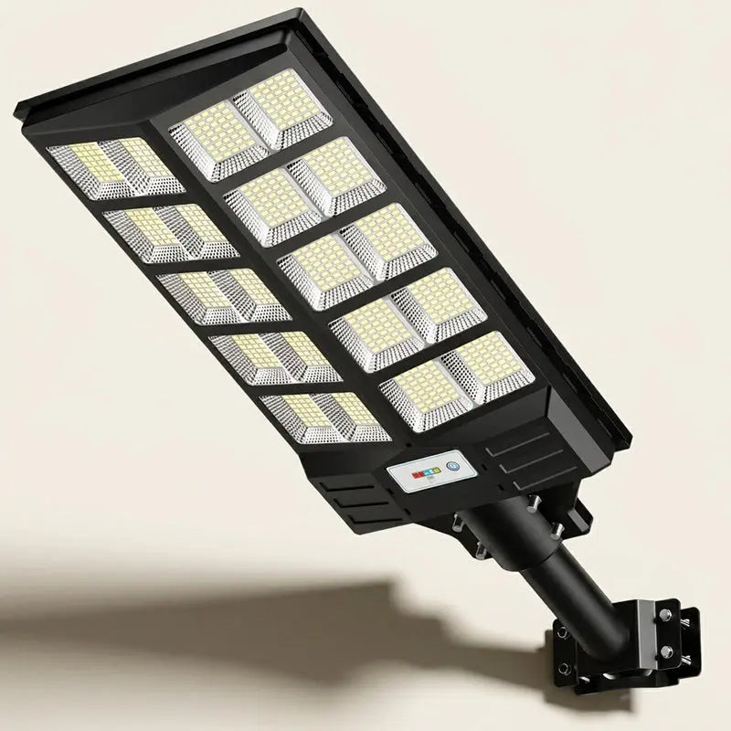 Black solar street light on a beige background