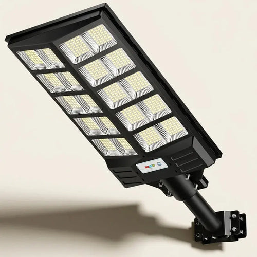 Black solar street light on a beige background