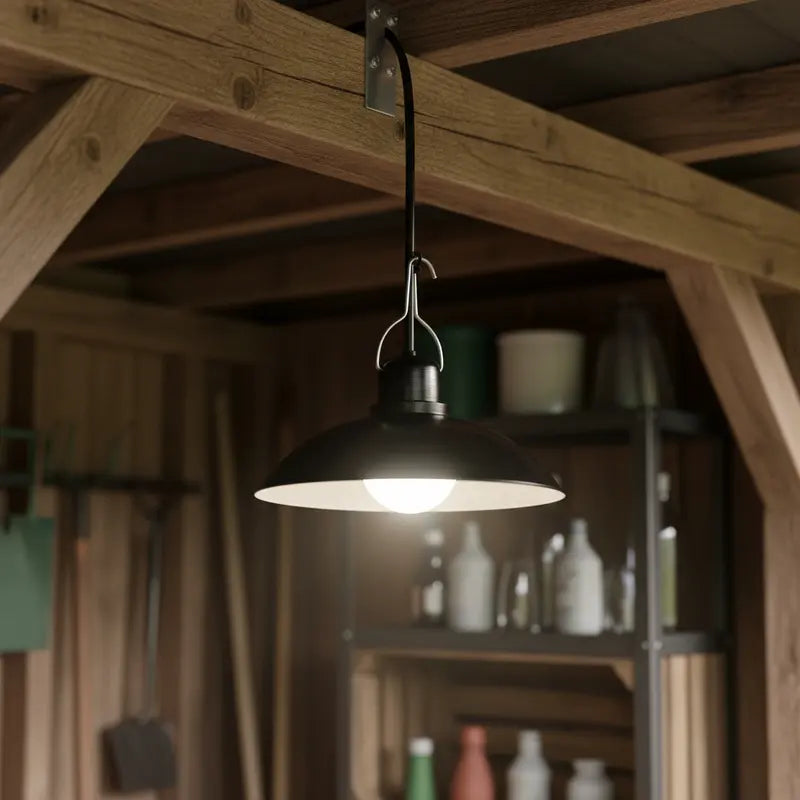 Black pendant light hanging from a wooden ceiling with a blurred background of shelves and bottles.