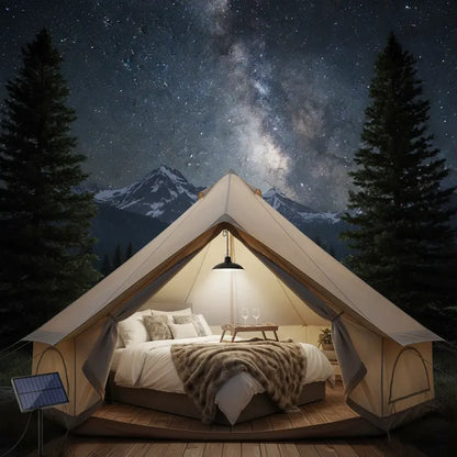 Luxury tent with interior view under a starry night sky with mountains.