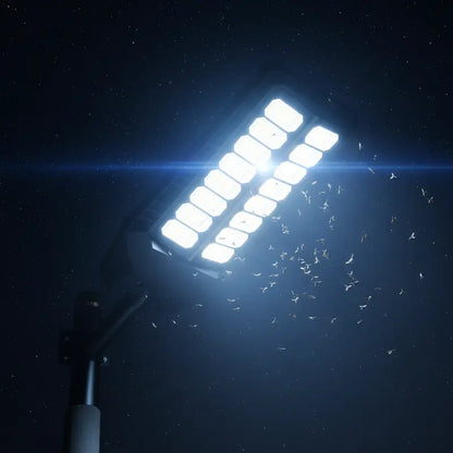 Street light with a blue glow against a dark background