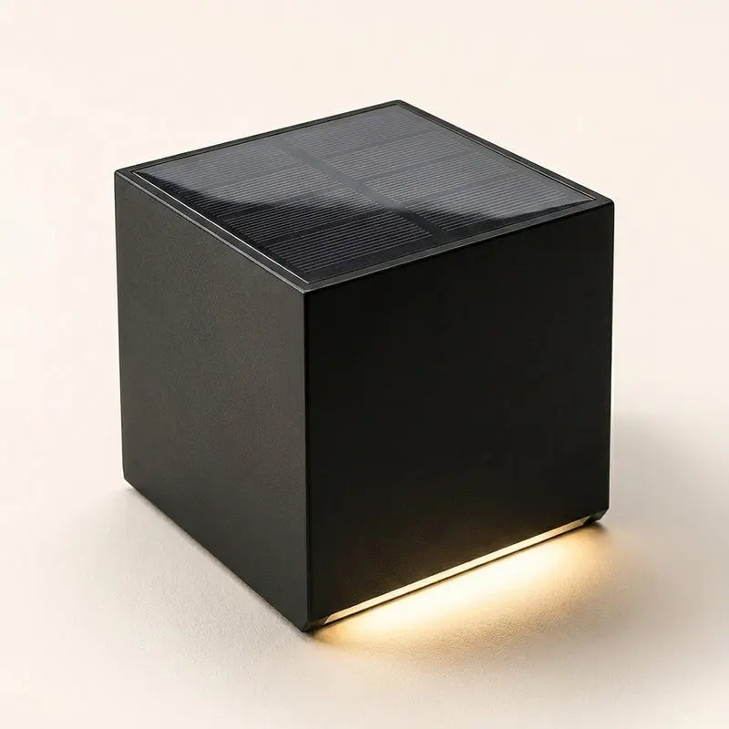 Black cube-shaped solar light on a white background