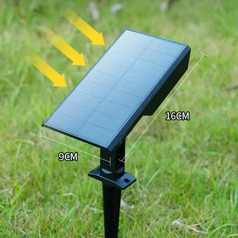 Solar panel on a stand with dimensions labeled against a grassy background
