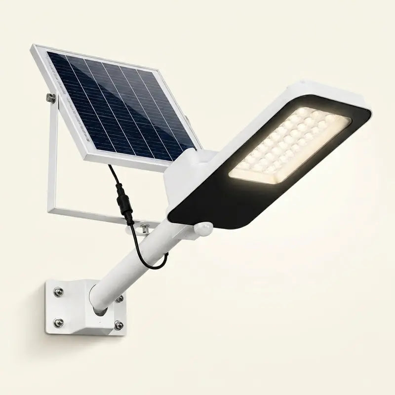 Solar-powered outdoor light fixture with solar panel on a white background