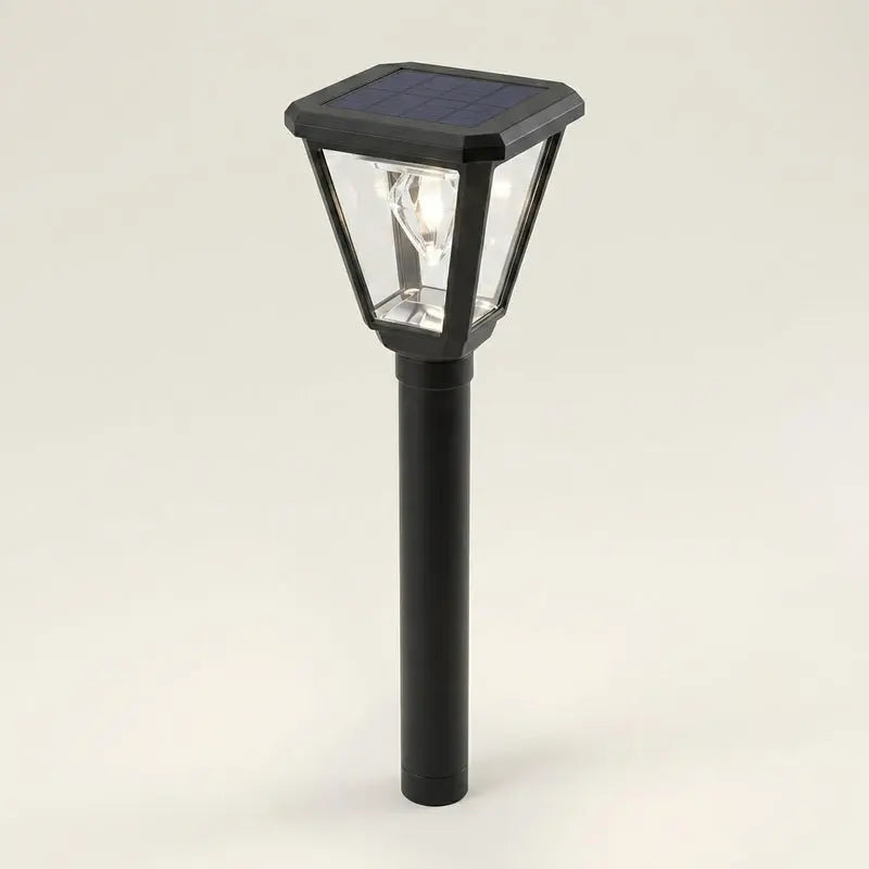 Solar-powered outdoor lamp on a beige background