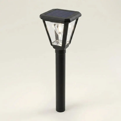 Solar-powered outdoor lamp on a beige background