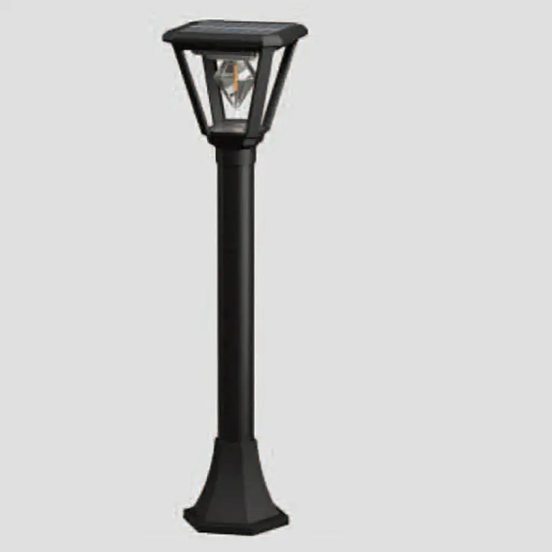 Black outdoor solar lamp post on a light gray background