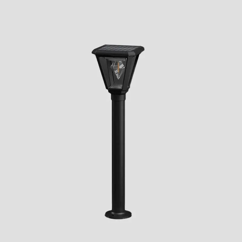 Black solar garden light on a gray background