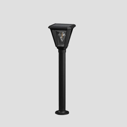 Black solar garden light on a gray background