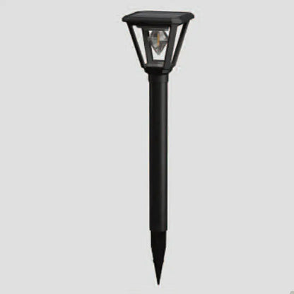 Black outdoor solar lamp on a gray background