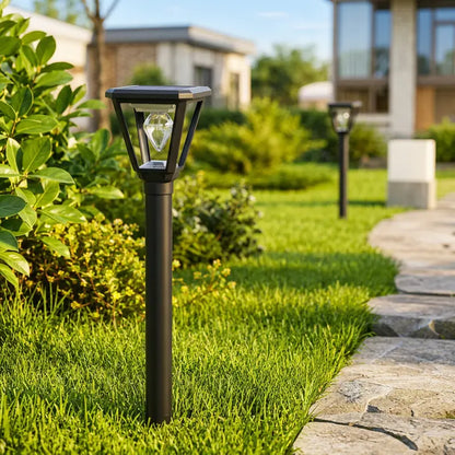 Garden light post in a well-maintained lawn with a house in the background