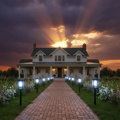 Stately house with a pathway leading up to it under a dramatic sky.